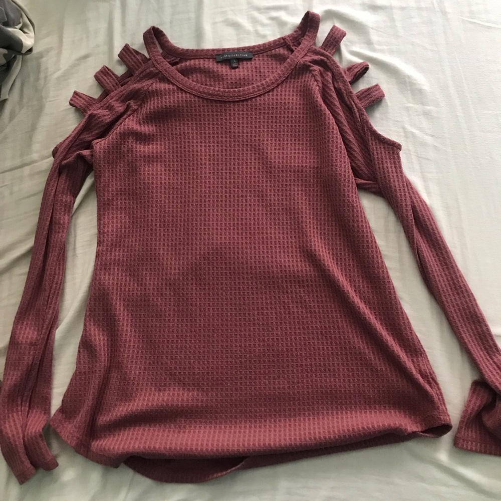 Long sleeve shirt with cut outs on shoulder